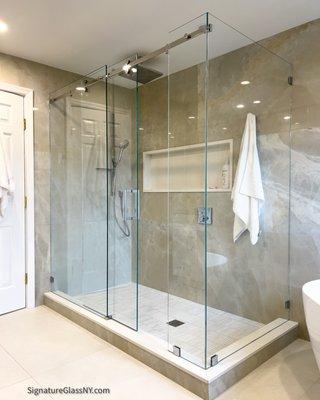 Serenity 90° sliding shower we used 3/8" thick Low-iron glass.