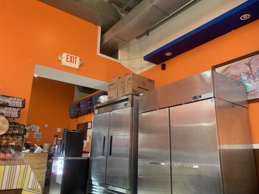 Inside the dining area... refrigerators...