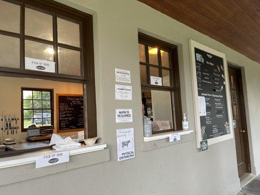 The window to order ice cream or go inside the store