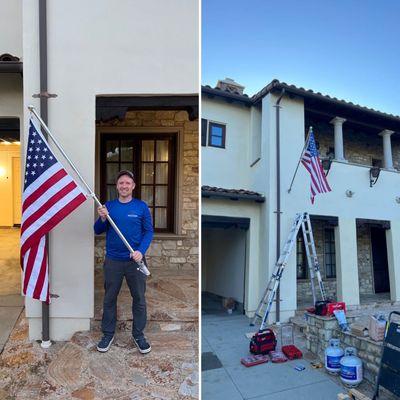 Installation of the flag on the facade of the house...