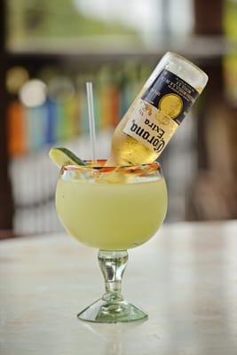 Margarona = Margarita made in hand blown Mexican glass with confetti rim + Corona Beer.