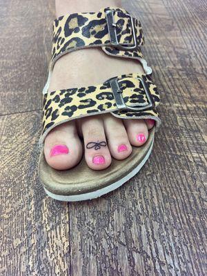 Toe ring tattoo by Amy