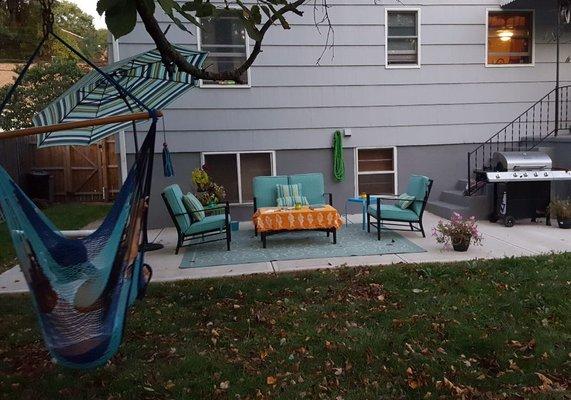 Client enjoying her backyard furniture