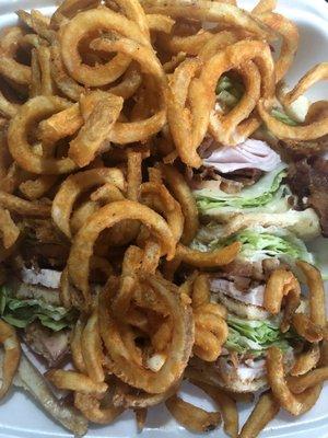 Turkey BLT club with curly fries