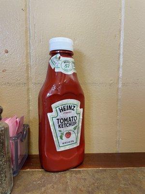 Stained and dirty ketchup bottle