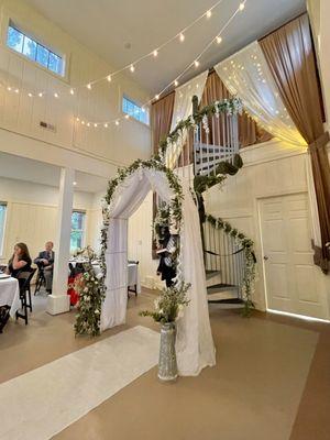 Wedding arbor inside Greenlands Hall