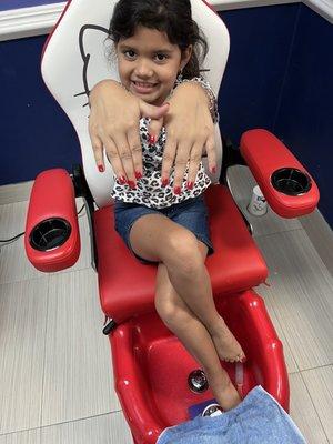 My daughters mani and pedi in these adorable child sized chairs!