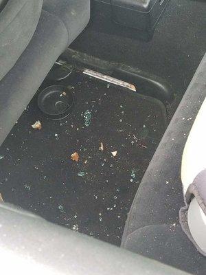 the floor board with hardly any glass there after the window blew out