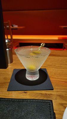 Dirty martini with blue cheese-stuffed olives.