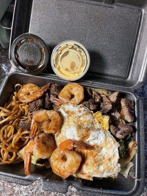 Steak and Shrimp with Fried Rice, Noodles, and Fried Egg.