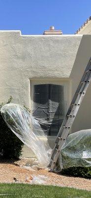 bad stucco work by this company showing through paint! needs to be redone!