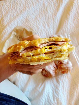 Inside of a ham, egg, and cheese croissant