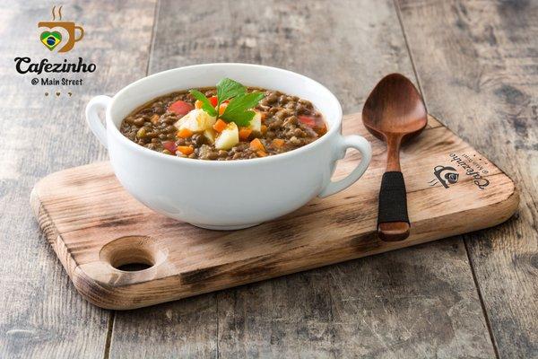 Warm up with our hearty lentil soup, made with a flavorful blend of spices and topped with fresh herbs. Perfect for a chilly day!