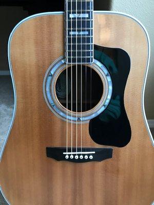 Beautiful rosette Todd added to my 1976 Guild D55 along with neck reset, bridge re-glue and other work.   Awesome job !