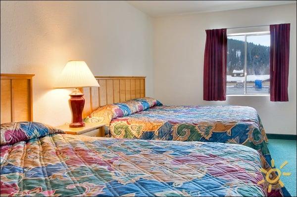 Large American room with two queen beds.