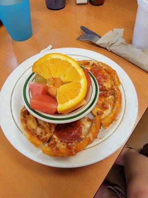 Kids pizza with a side of fresh fruit