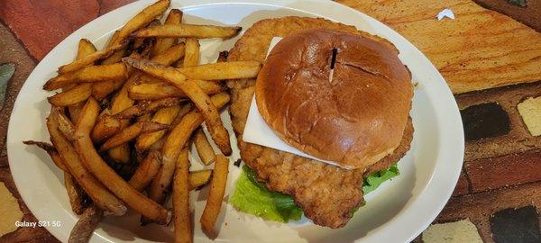 Pork tenderloin sandwich and fries