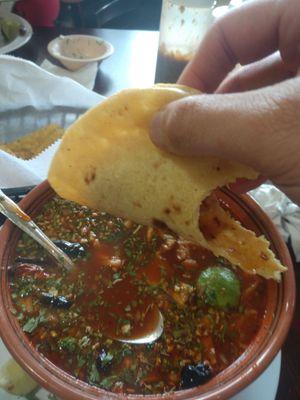 Mexican menudo with in house corn tortilla taco