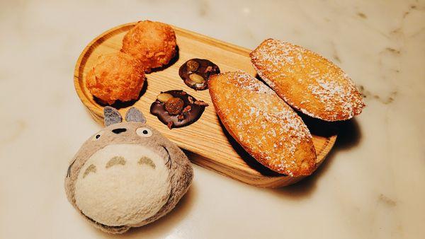 Lemon madeleine, coconut cookie, and raisin chocolate .