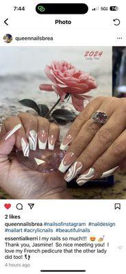 Full set acrylic nails, pink and white French manicure with designs and gems.