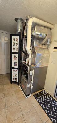 Replace a gas furnace with 100,000 BTU with 95% Efficiency.