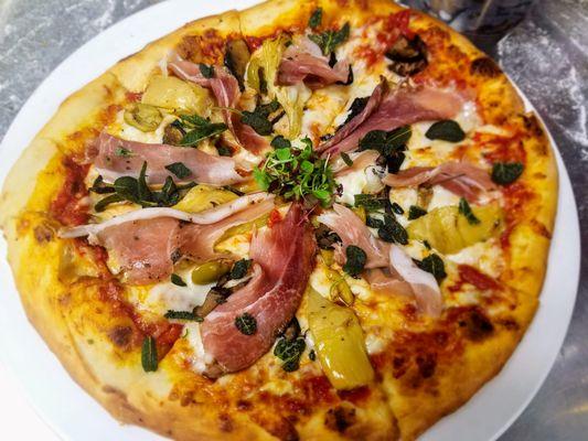 CAPRICCIOSA
 $18.00
 Blended plum tomatoes, mozzarella, speck, mushrooms, artichokes, olives