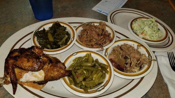 Pork, beef, chicken, collards, green beans and slaw. I will take half home!