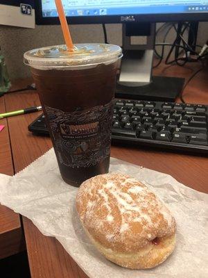 Medium black iced coffee and my free jelly donut because of National Donut Day!