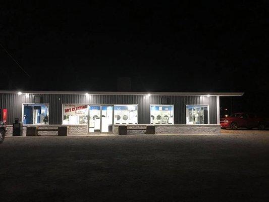 Street view of the building at night.