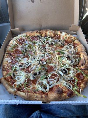 Pepper mushroom onion sausage pepperoni pizza.His crust is amazing!