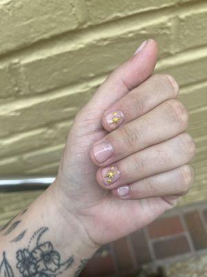 Gel manicure with 3D gems.