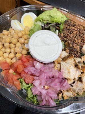 Cobb Salad with added chickpeas and onions.