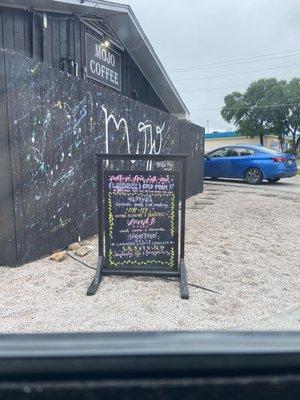 A girl that works there creates a beautiful piece of art on this chalkboard of many special drinks you can try!