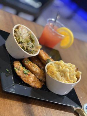 IG @foodie__fe :Chicken tenders with sweet chili sauce, cabbage w/sausage, Mac n cheese. (Not sure what drink my friend ordered)