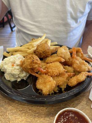 Butterfly shrimp with hush puppies, fries and cole slaw