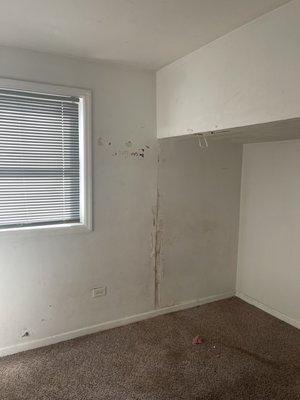 Drywall damage, worn out carpets.