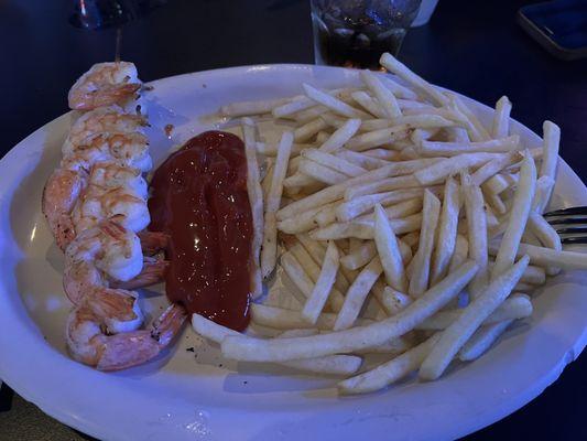 Grilled Shrimp and Fries - Alright - I asked for Blackened Shrimp but our waiter was a ditz. They charged me 50¢ for cocktail sauce.