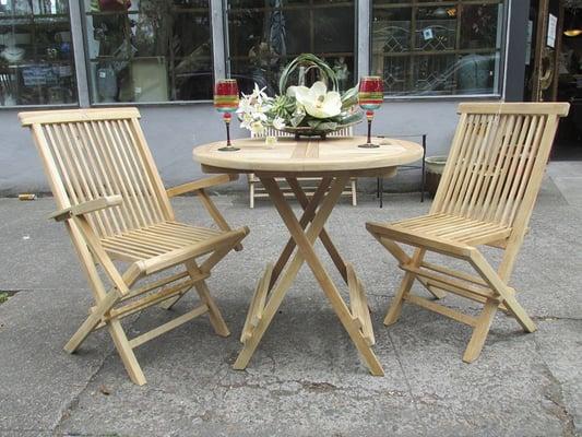 We have a large selection of new Teak patio furniture!