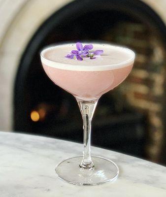 Violet Femme: fresh violets, housemade black raspberry liqueur, fresh lemon juice, gin and lillet!