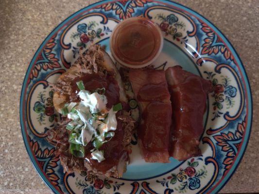 Half a Chopped Brisket Baked Potato and Couple of  St Louis Ribs.