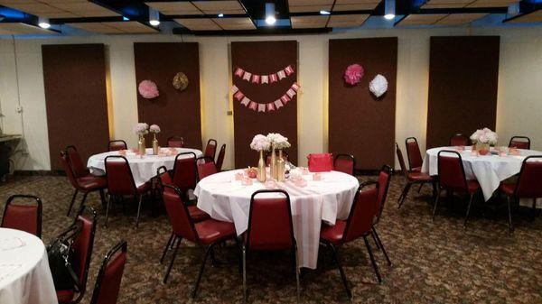 Another centerpiece for my sisters bridal shower - single wine bottle vases with pink, champagne and white florals!