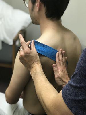 Kineso-taping for pain relief, support, and muscle recruitment