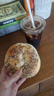 great bagel and cream cheese with black coffee