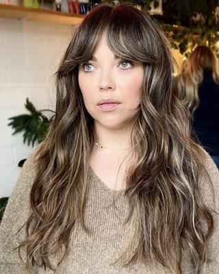 Sunkissed brunette and curtain bangs