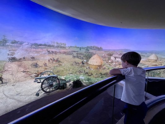 My son watching the program at the Paul Philippoteaux's 1883 cyclorama depicting Pickett's Charge.