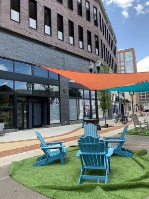 Outdoor community seating at Foster Coffee Co