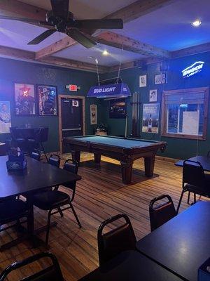 Pool table and Elvis memorabilia.