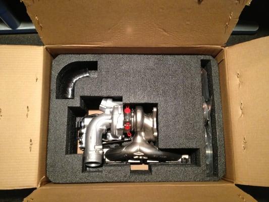 Upgraded APR turbo kit ready to be installed in a 2008 VW GTI