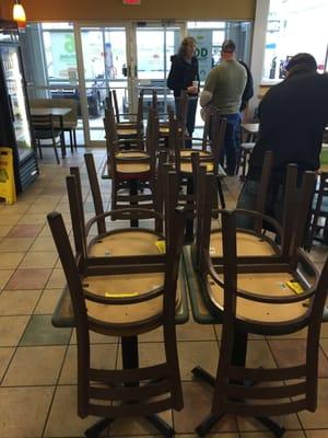 These are the photos I promised I would upload. Here you can clearly see the chairs with the yellow notes stacked on nearly every table.