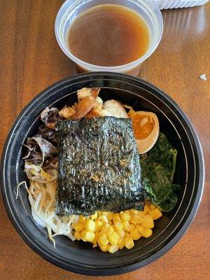 Ramen - broth in a separate container - Yes, that is nori seaweed paper on top!